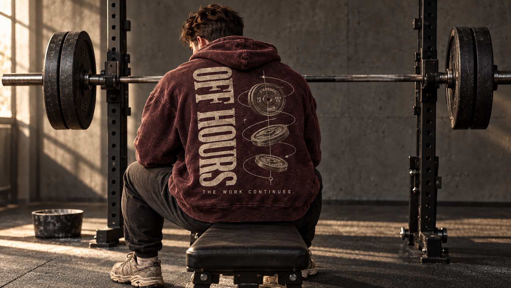 Athlete wearing the Off Hours hoodie in a quiet gym